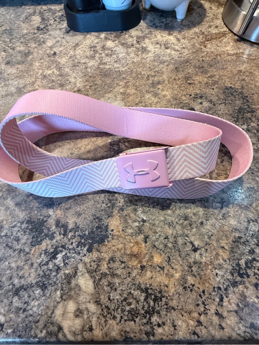 Like new adjustable Under Armour Pink Chevron Webbing Belt